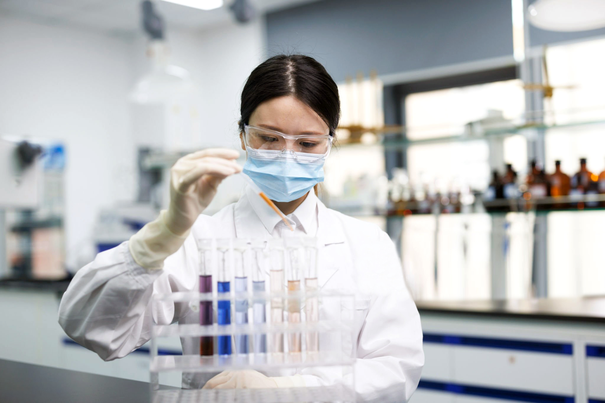 one female scientists work in laboratories